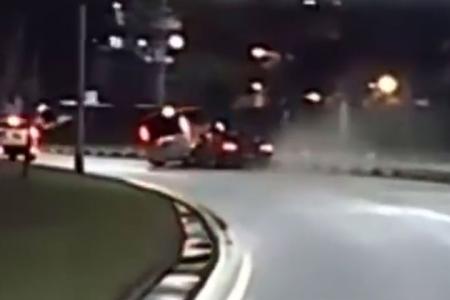 Driver rams sedan into rear of MPV for not giving way