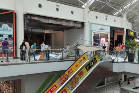 Hoarding board at Jurong Point store under renovation falls and injures three