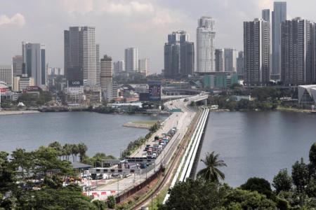 Singapore, Malaysia to reopen land borders on April 1
