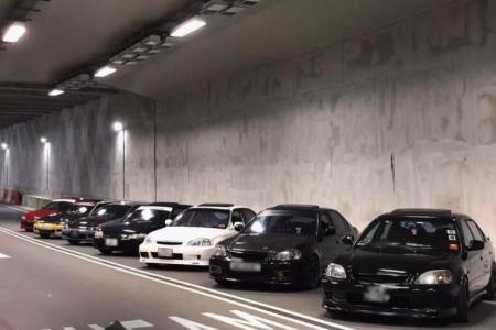 'Dude, check out my car': Fleet of Honda Civics block tunnel lanes for illegal photo shoot