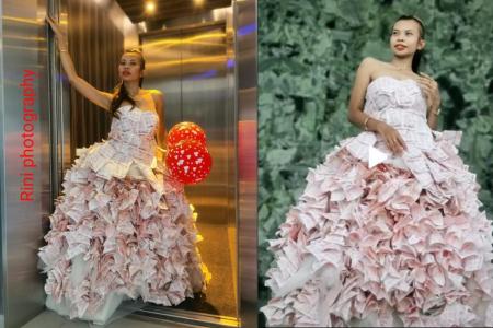 All hail the Queen of 4D: Woman turns $20,000 worth of lottery tickets into ball gown