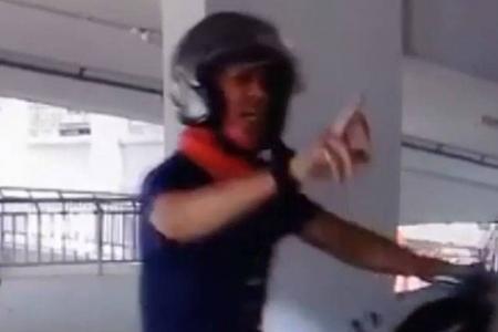 Rider apologises for flashing middle finger at driver