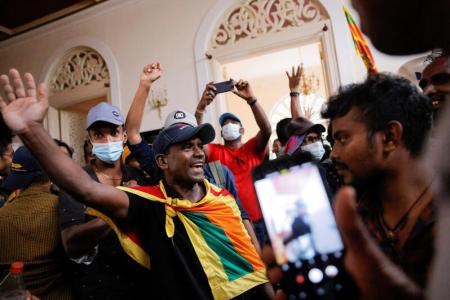 Protesters storm government buildings in Colombo, President Rajapaksa flees