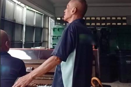 Crooning cleaners wow netizens with soulful rendition of Malay ballad – inside a bin centre