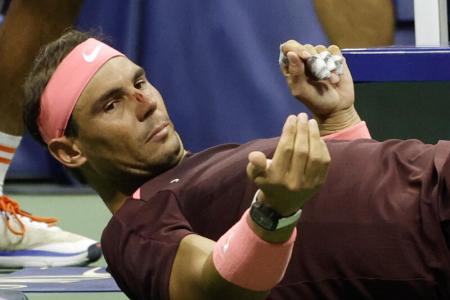 Nadal overcomes freak racket injury and Fognini to reach 3rd round at US Open