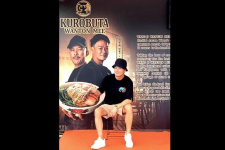 Actor Thomas Ong is busy dishing out wanton noodles at food festival