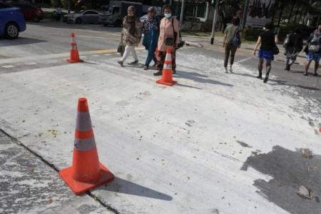 Spilled paint at pedestrian crossing in Eunos causes two to slip and stain their clothes