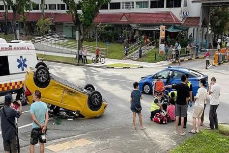 Couple seen fleeing the scene after car collides with cab and overturns