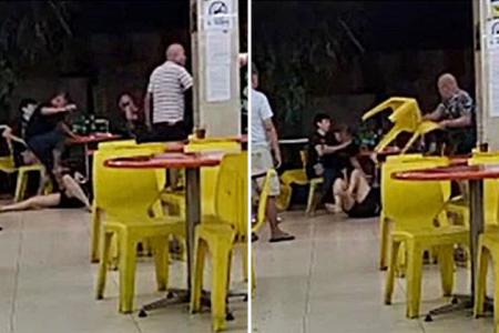 Men slap, kick and hit beer lady with chair for refusing to play peanut betting game