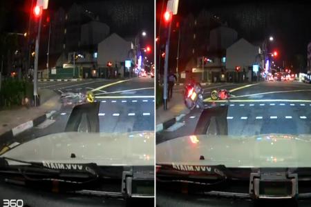Rider skids, falls and runs off as authorities give chase in Geylang