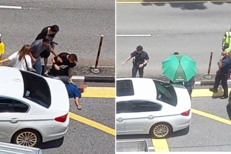Man sprawled in middle of the road after alleged altercation, pedestrians intervene