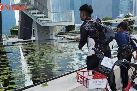 Youths fish openly at MBS, make away with catch of goldfishes
