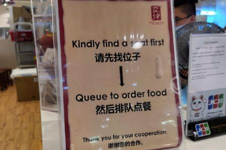 Against the rules? Woman shooed away from table at Ya Kun outlet