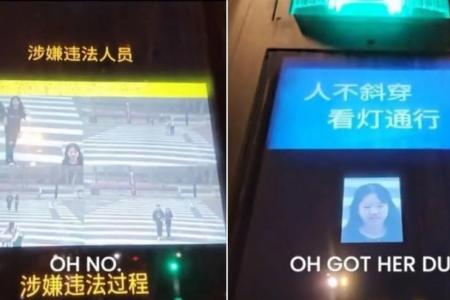 China jaywalkers publicly shamed, faces flashed on screens