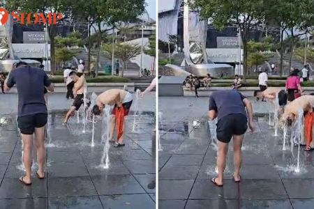 Men wash 'armpits and butts' at water fountain outside National Stadium