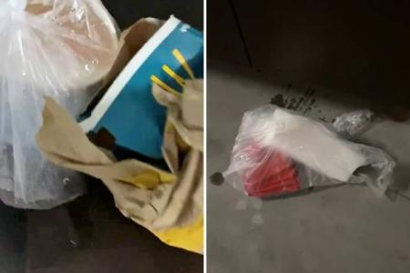 Grab delivery rider throws food order outside customer's home