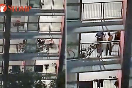 Drunk shirtless husband kicked and punched by 3 men after wife locks him out of Buangkok flat