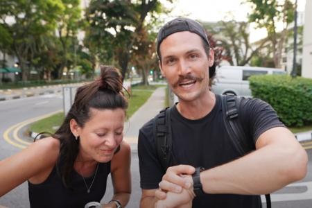 Tourist couple walk 12 hours from Woodlands to MBS  – to see more of S'pore 
