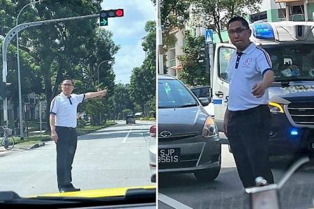 Mayor Alex Yam directs traffic after accident at Choa Chu Kang junction