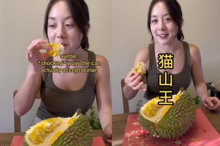 American woman 'acquires taste' for durian after first bite, locals impressed