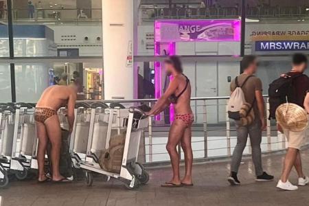 Tourists spotted wearing only trunks and slippers at Phuket airport
