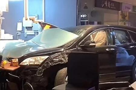 Shop assistant taken to hospital after car  crashes into Geylang eatery  