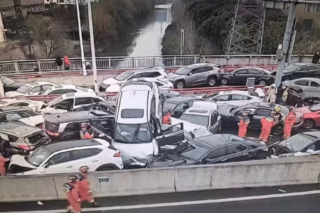 Several injured in 100-car pile-up on icy China expressway