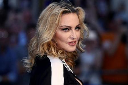 Madonna on 'road to recovery' after hospital stay