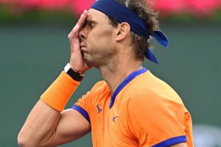 Nadal out for up to six weeks with rib injury