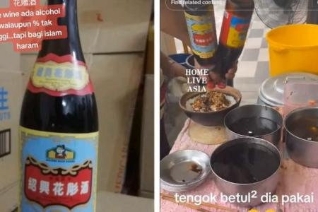 Malaysian hawker under fire for selling claypot chicken rice cooked with rice wine, no halal cert