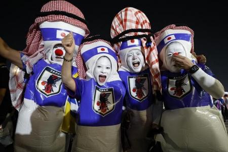 Japanese fans a hit in Qatar with Samurai, bowling pin costumes 