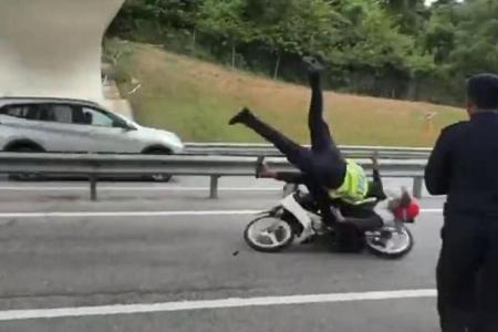 Motorcyclist in Malaysia arrested after ramming into road transport officer at roadblock 