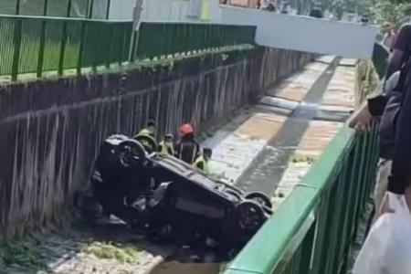 Skidding car ends up in Bukit Batok canal, driver taken to hospital