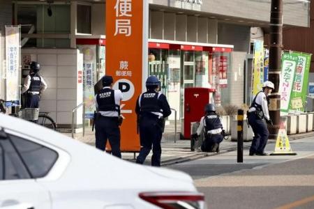 Suspected gunman detained after taking female staff hostage in Japan post office