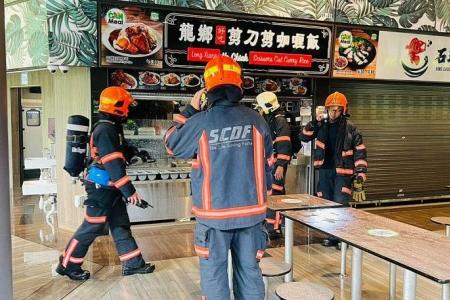 Customer, hawkers put out fire at stall in Sembawang
