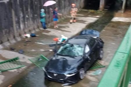 Woman taken to hospital after car skids into Bt Batok canal