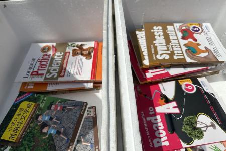Boxes of assessment books found outside West Coast Lane home