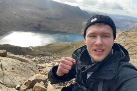 ‘It’s a mental push’: Amputee reaches highest mountain in Wales in less than 6 hours 