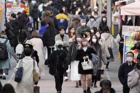 Japan set to remove most Covid-19 restrictions as new infections ebb
