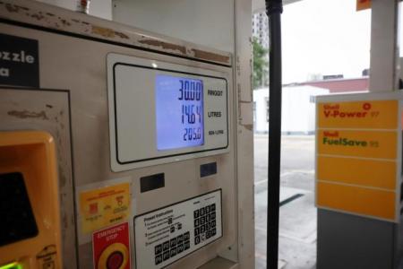 Johor Baru pump attendants patrol stations for illegal filling of subsidised RON95 petrol
