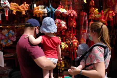Singaporeans going ahead with CNY plans despite Covid-19 surge, Chinatown businesses see boost in sales
