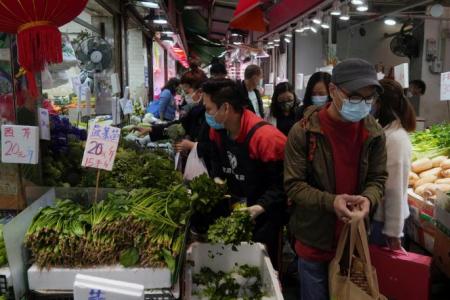 Shoppers throng Hong Kong's markets after curbs announced