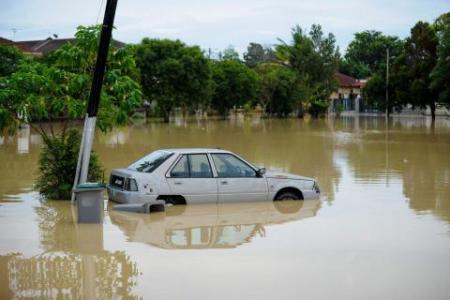 Fear and anxiety as people in Malaysia brace themselves for more floods