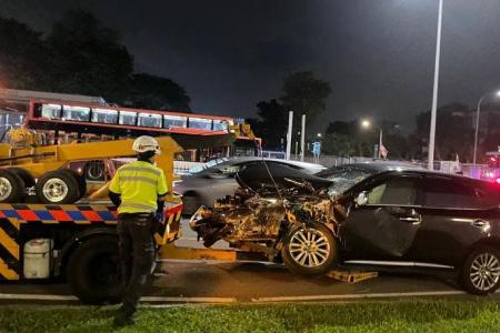 Woman taken to hospital after accident involving Go-Ahead Singapore bus and car