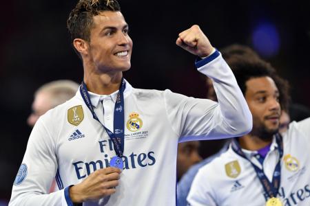 Real Madrid's Cristiano Ronaldo celebrates after winning the UEFA Champions League Final