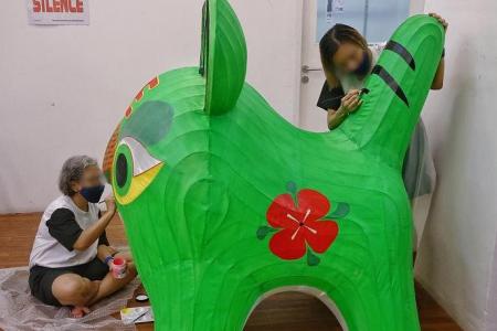 Female prison inmates create tiger lanterns for Gardens by the Bay's Mid-Autumn Festival