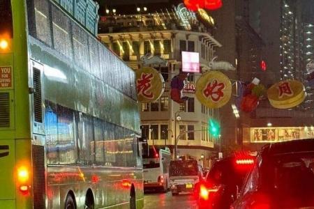 Mid-Autumn festive decor in Chinatown comes loose, blocking double-decker bus 