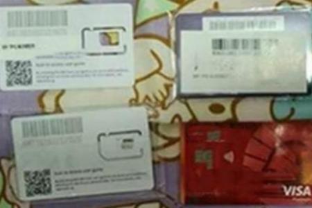 13 arrested over phishing scams targeting OCBC customers