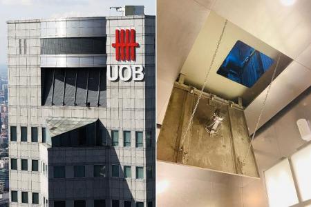 Family stuck in lift for over 3 hours at UOB Plaza 1, rescued by SCDF officers