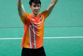 Loh Kean Yew celebrates after defeating Anders Antonsen of Denmark in their semi final.